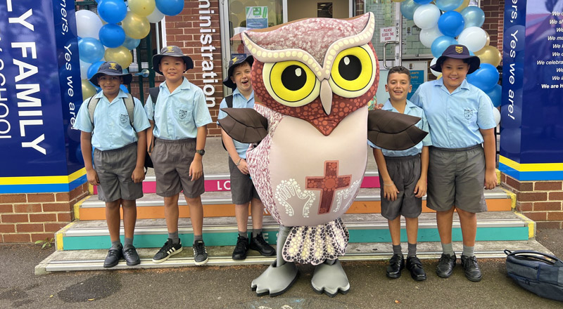 Students with the Holy Family Catholic Primary East Granville school mascot