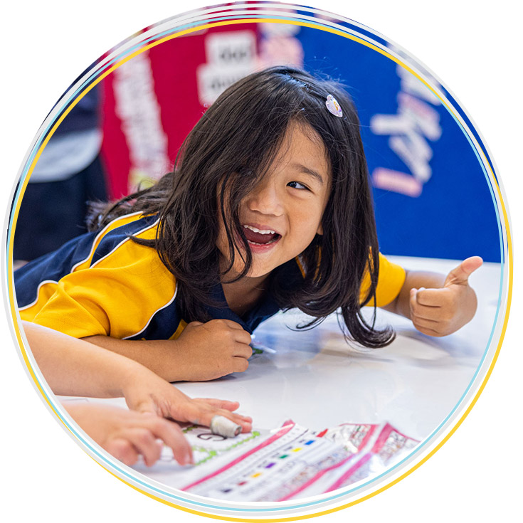 Girl excited to be learning at Holy Family Catholic Primary East Granville