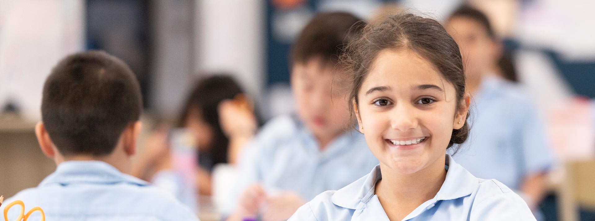 Happy student studying, at Holy Family Primary East Granville
