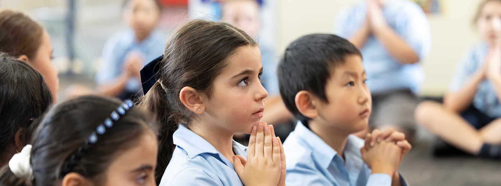 Holy Family Primary, East Granville student in prayer