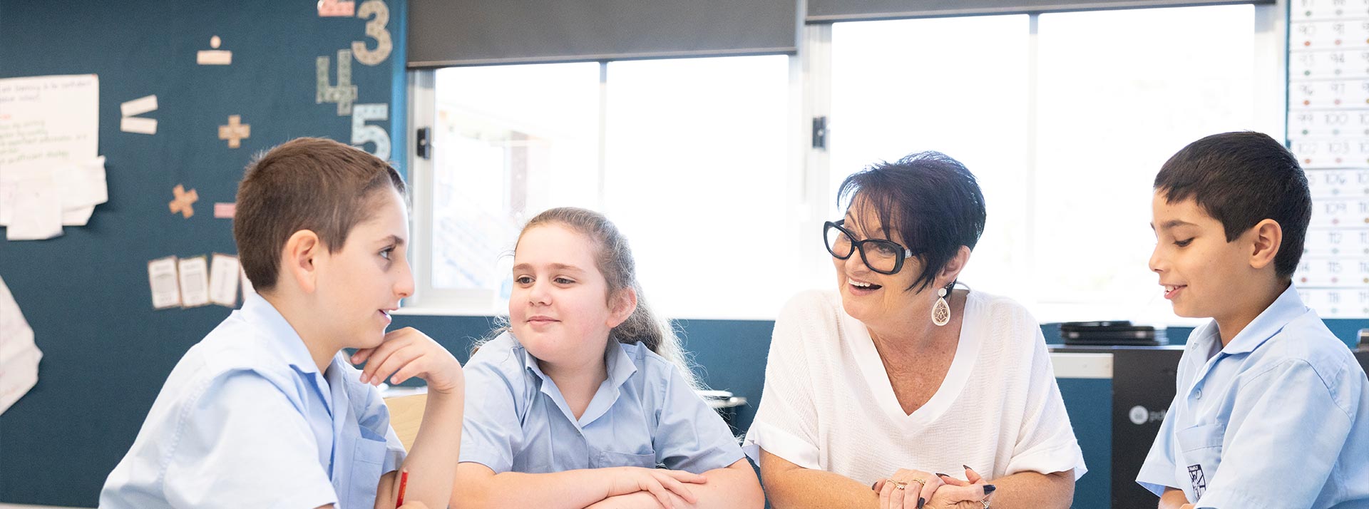 Cheryl Fortini, Principal of Holy Family Primary, East Granville and students in class
