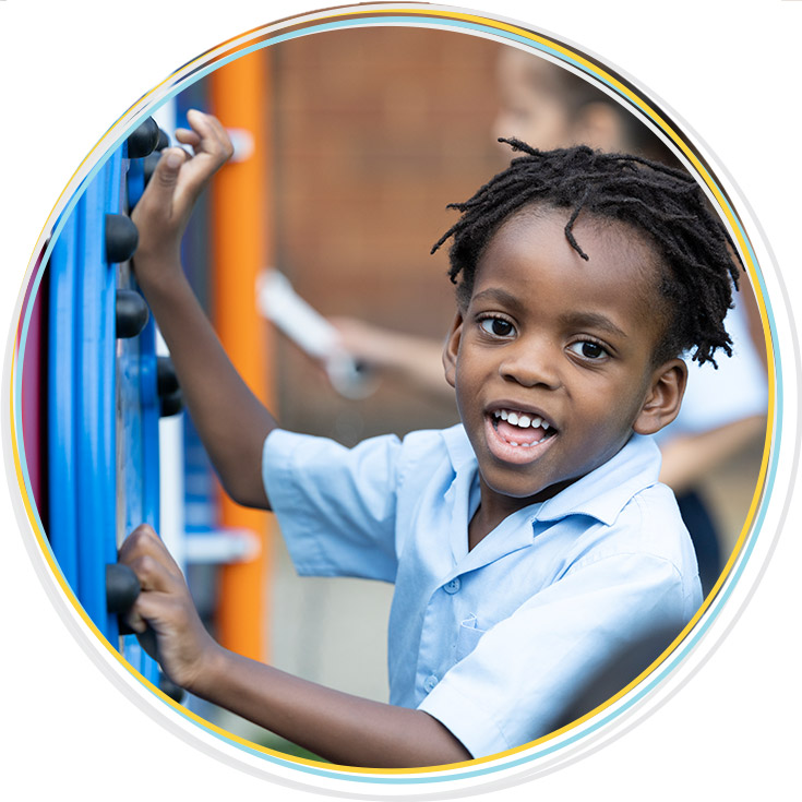 Holy Family Primary East Granville student playing with outdoor equipment