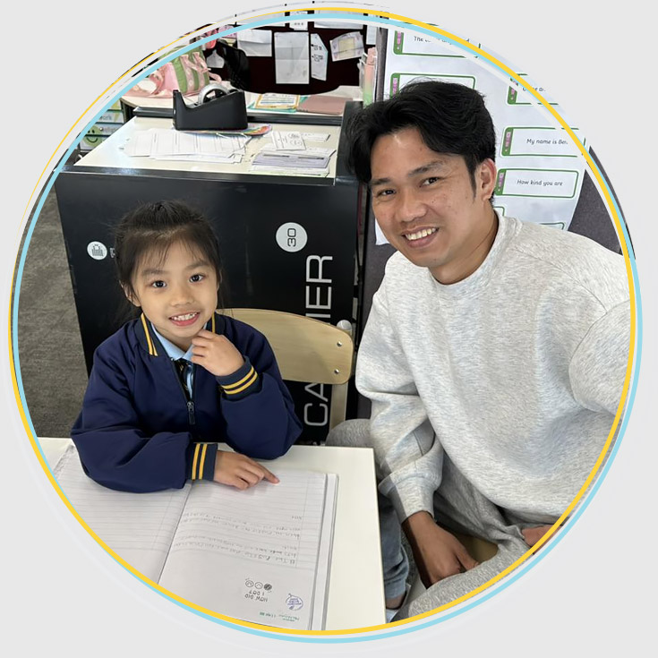 Dad assisting Daughter with classwork